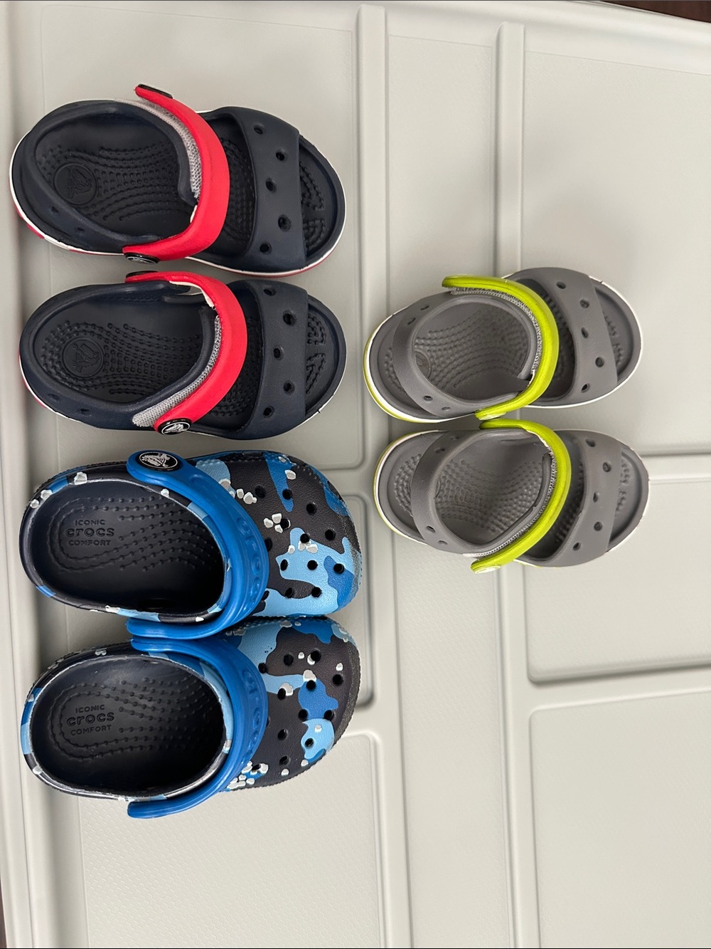 CROCS Kids' Sandals Trio in Black/Red, Gray/Neon Yellow, and Blue Camo